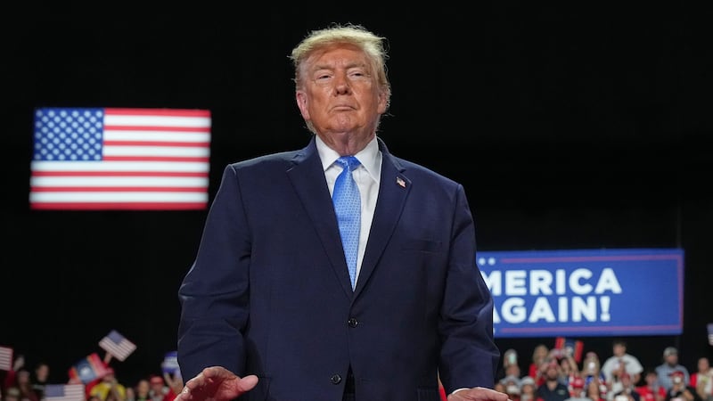 President Donald Trump arrives at a campaign rally at Crossroads Arena, in Corinth, Miss.,...