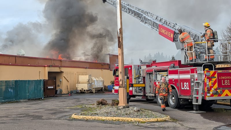 Fire crews are battling a two-alarm fire at the Red Lion Hotel in Kelso on Saturday afternoon,...