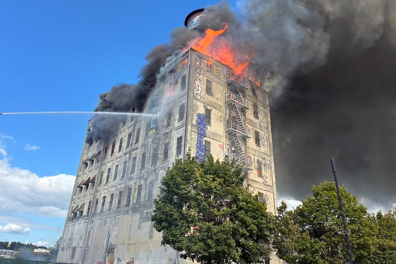 Crews monitor smoldering Centennial Mills after fire; PDX-SEA Amtrak service suspended