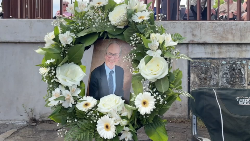 Flowers with messages offering prayers and thanks to St. Helens City Administrator John Walsh...