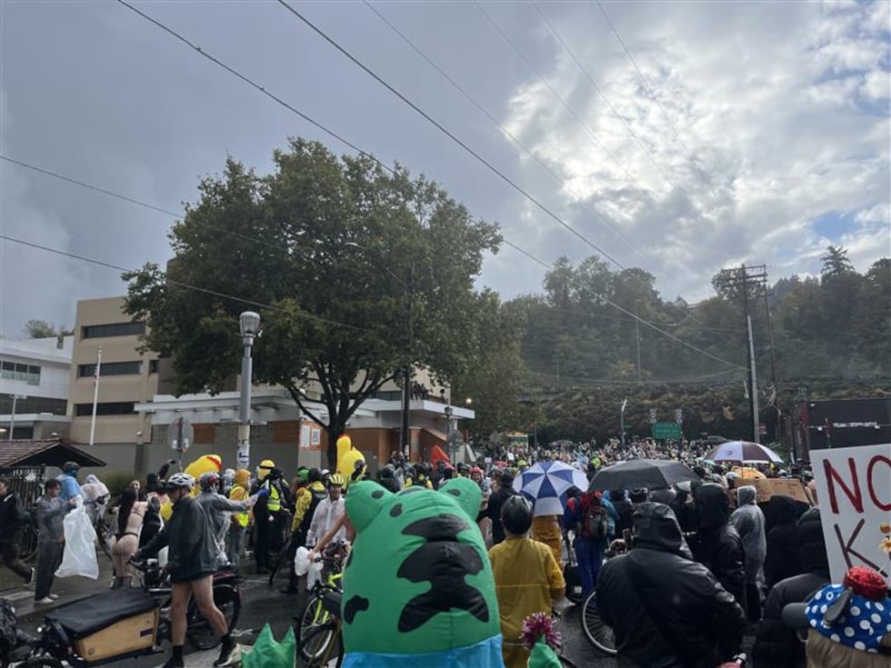 'Emergency Naked Bike Ride' ICE protest arrives at Portland, Ore. ICE building. Oct. 12, 2025.