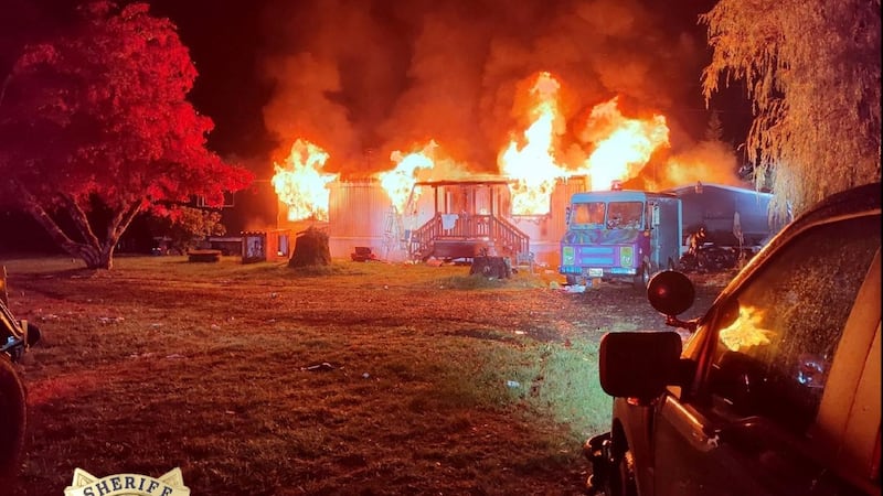 A man was arrested for assault charges after he burned his house down during a standoff with...