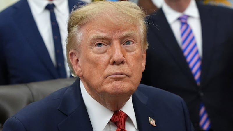 President Donald Trump listens during an event about healthcare in the Oval Office of the...