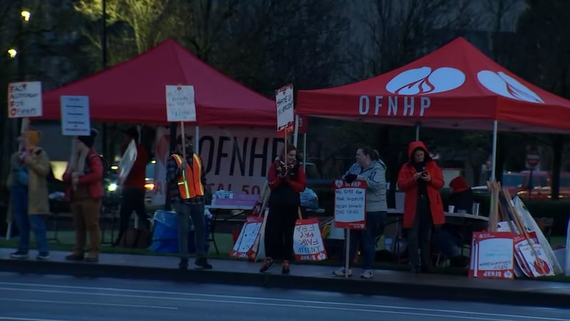 Healthcare workers picket outside Kaiser Sunnyside