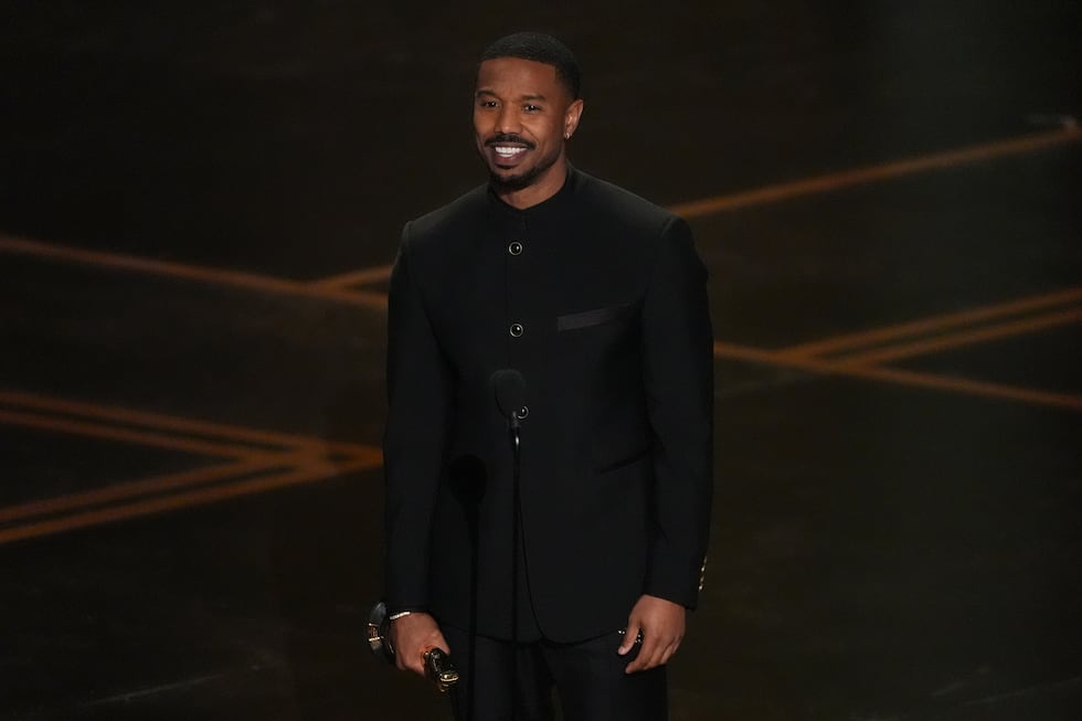 Michael B. Jordan accepts the award for actor in a leading role for "Sinners" during the...